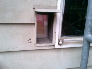 One of the cute features of this house when we moved in was this elevated 'cat' door.  It was about 4ft of the ground and had a leather flap. Based on neighbour tales, it did a poor job of keeping out the raccoons. 