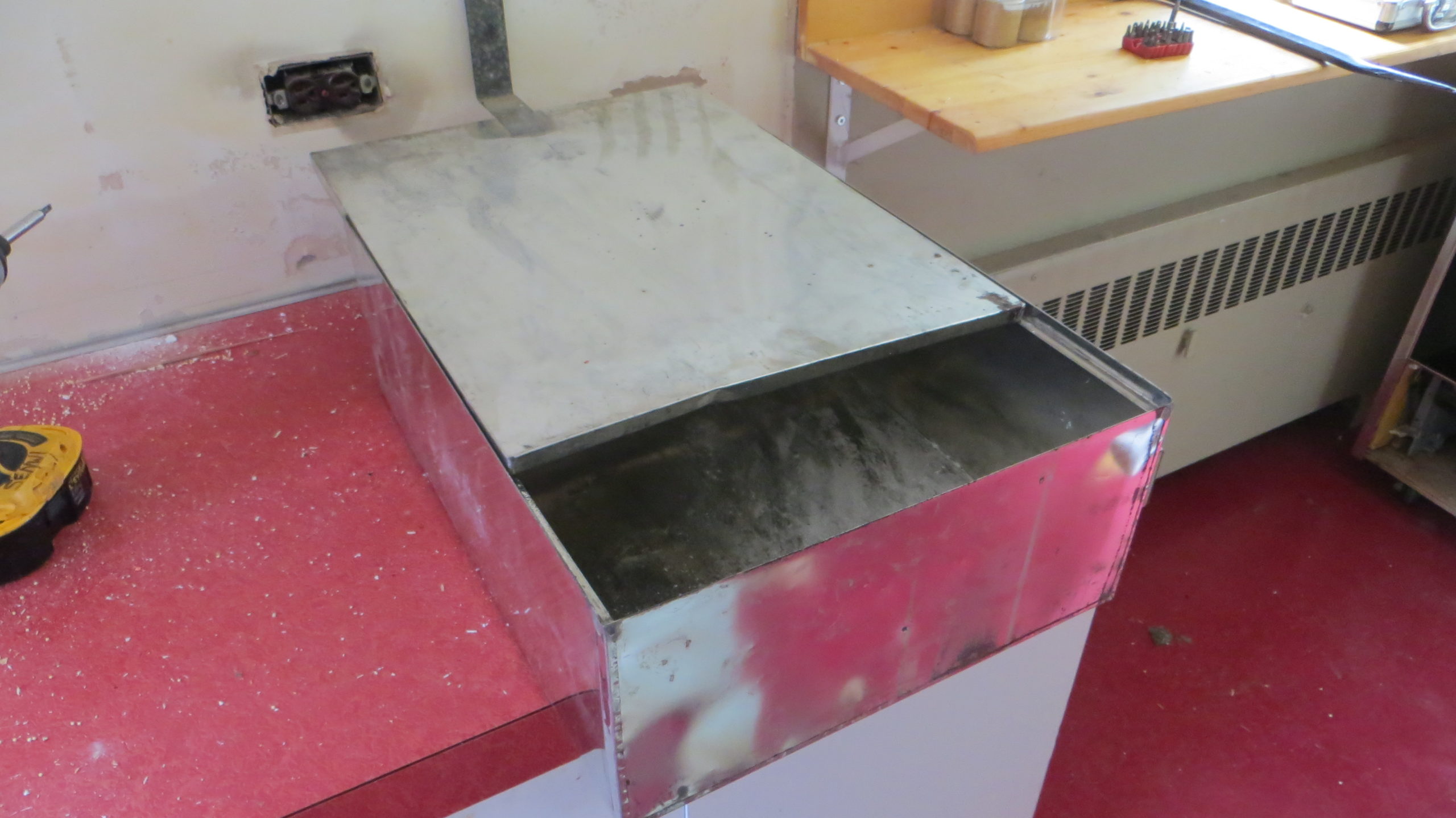 Figure : Tin Lined drawer with lid that slid into place when drawer was closed.