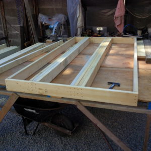 I built a quick table to assist in framing the walls.  This allowed me to lay the lumber on the table so I did not have to hold anything while I nailed it together.